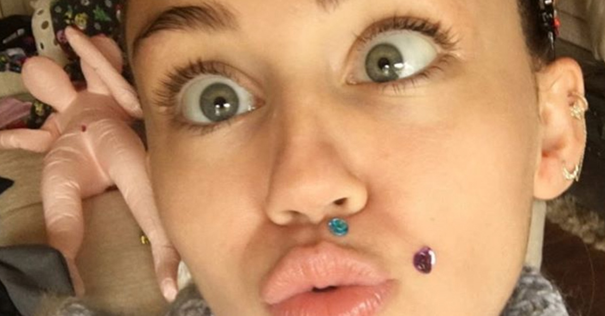 Miley Cyrus admits she's “trying to hide something” with these latest body stickers - Rare.us